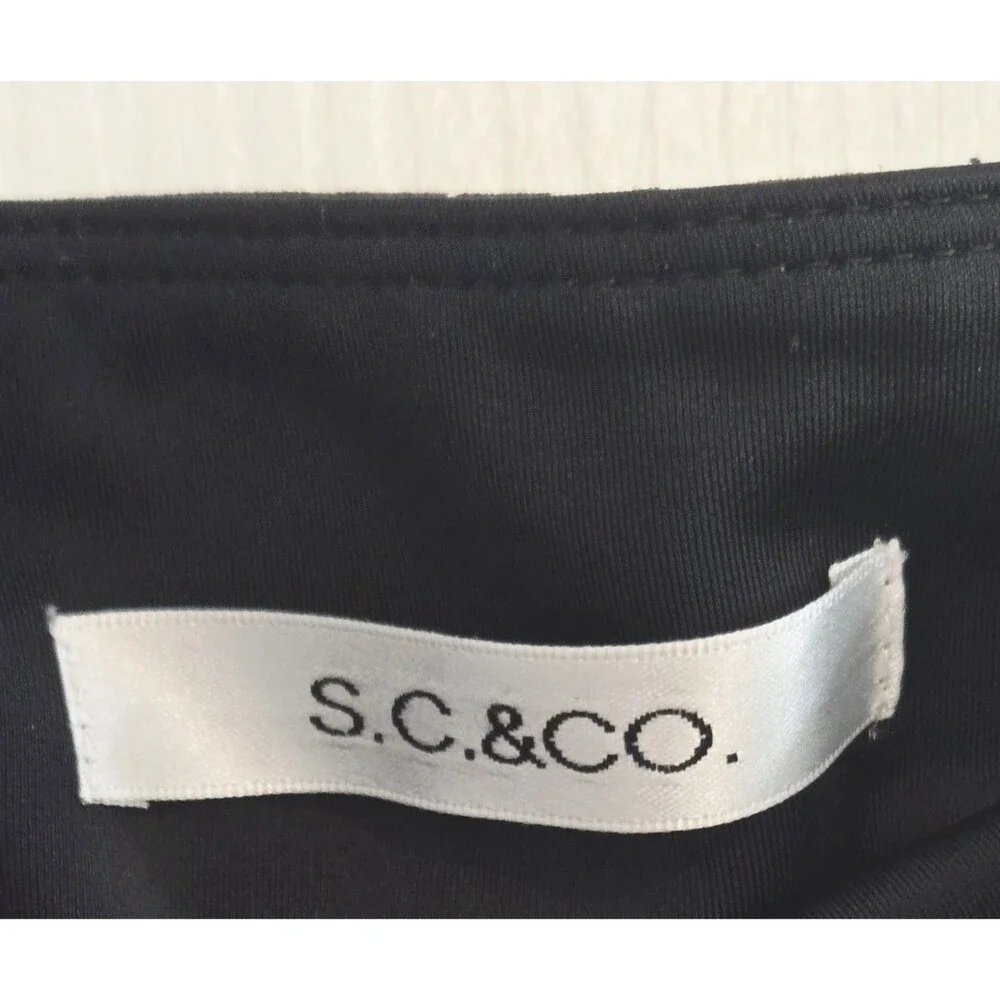Women's S.C & Co. Black/White Floral tummy Control Pull On Skort/Skirt Large - Picture 3 of 6